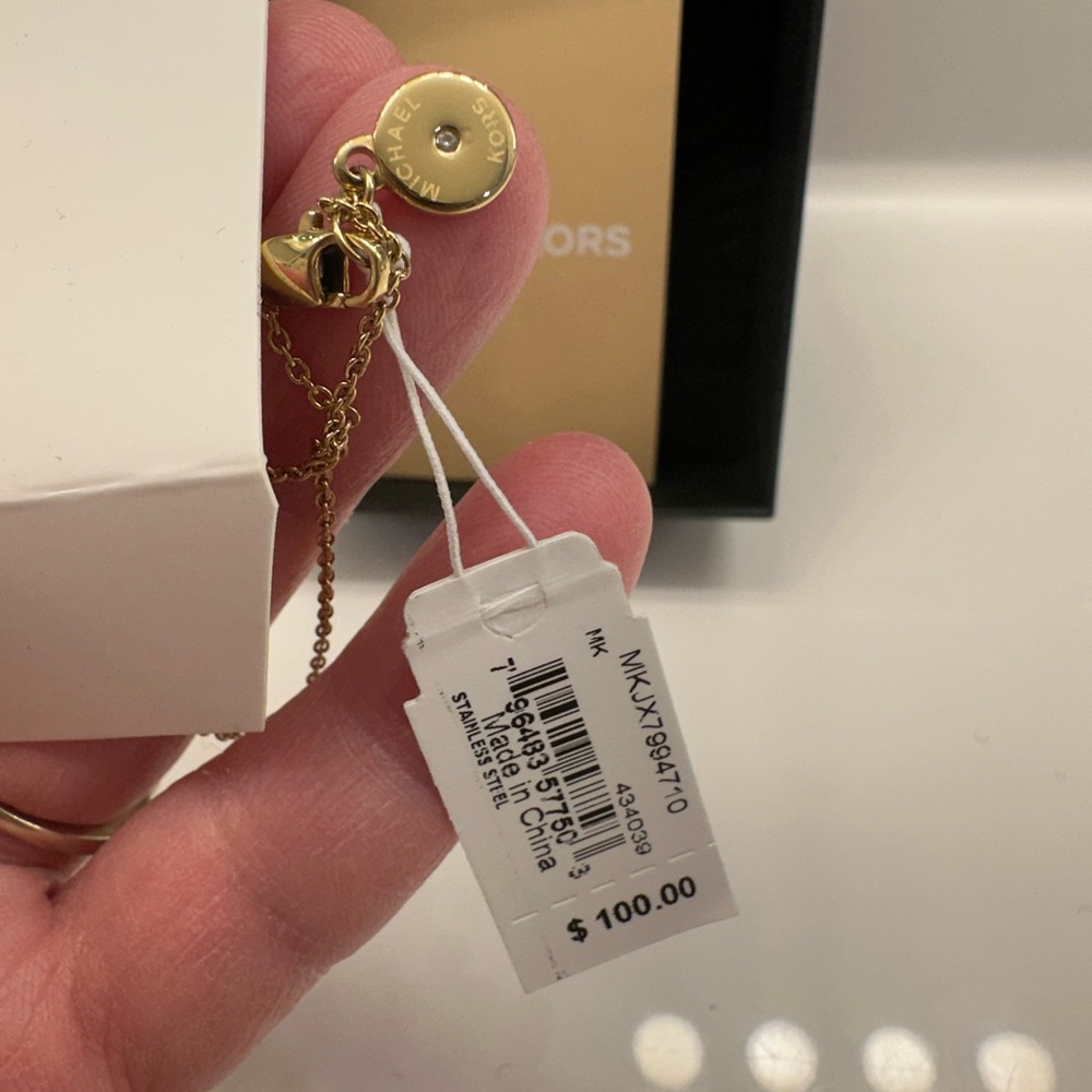 Michael Kors Gold Circular Pendant Necklace - Picture 2 of 2